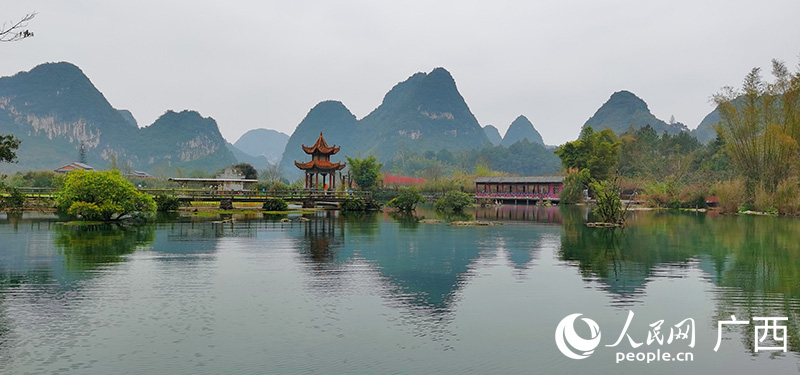 景色幽雅的鹅泉宛如一幅山水画。人民网 付华周摄 景色幽雅的鹅泉宛如一幅山水画。人民网 付华周摄